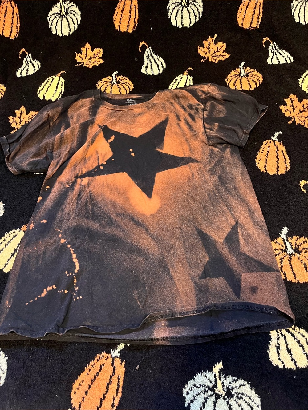 #24 Black Tee with Orange Bleach Star available on live sept 7th 9am mst